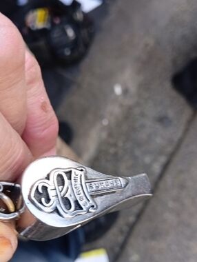 Vintage Silver Whistle Keychain with Decorative Crest